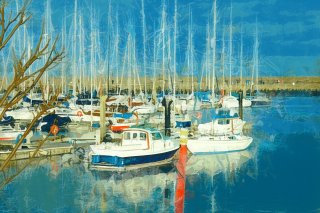 a group of boats in a harbor 
bray.pier.jpg Howth Harbour in Ireland